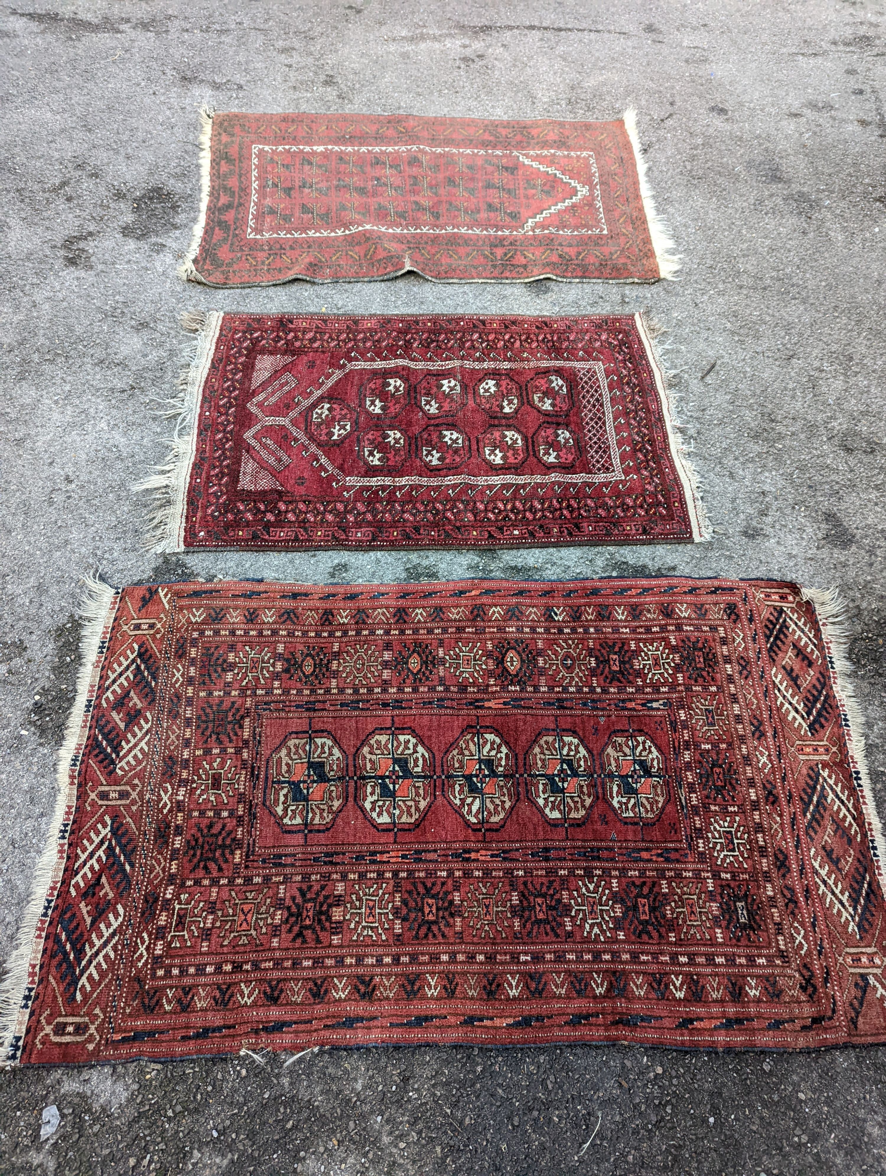 Three Bokhara rugs, largest 134 x 84cm